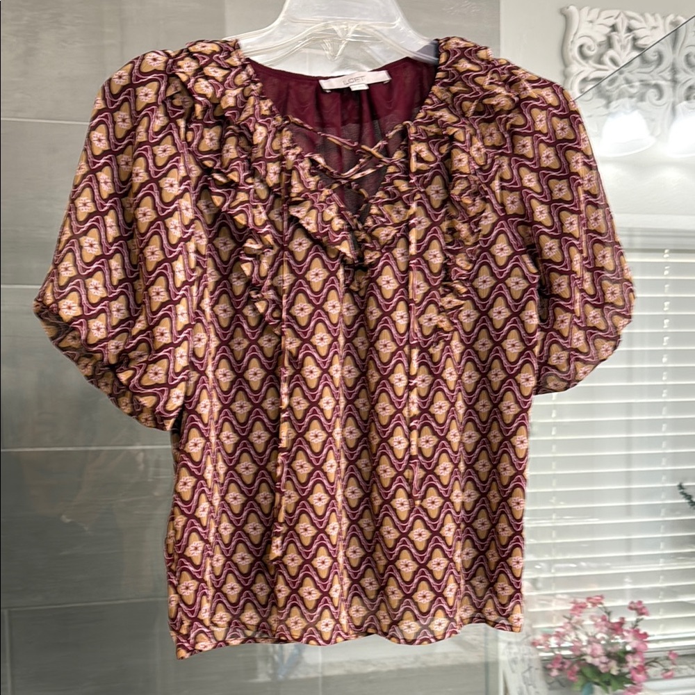 Elegant Purple Blouse with Gold Accents and Floral Design
